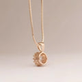 Rose gold crystal crown pendant with clear gemstone set in beaded bezel on matching snake chain from classic jewelry sets