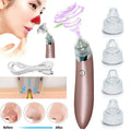 Rose gold electric blackhead vacuum with strong suction, clear circular hole head attachments, and silver metallic band for blood circulation