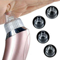 Rose gold electric blackhead vacuum with pink metallic body, circular hole head, clear attachments, and textured grip for blood circulation