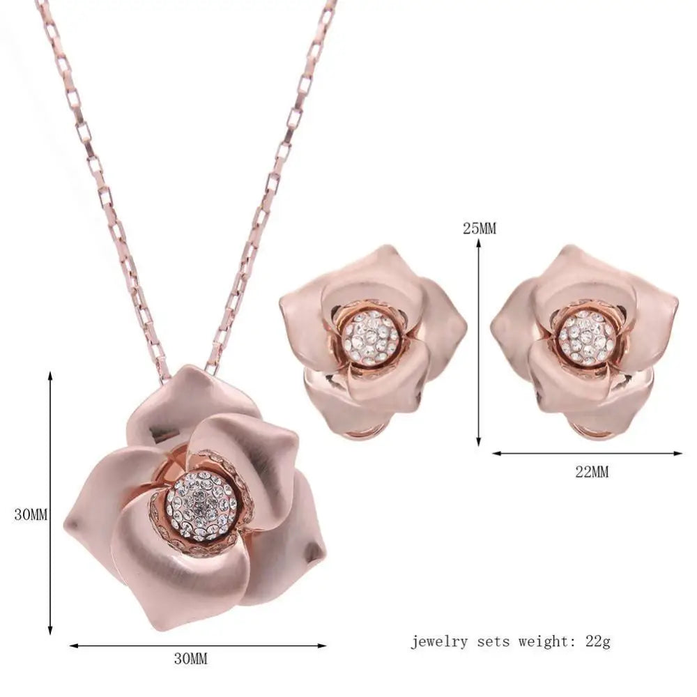 Rose gold flower pendant necklace with sparkling diamond center and matching stud earrings for trade goods bride wedding jewelry set