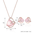 Rose gold heart pendant necklace with pink opal stone and diamond accents complementing pink jade earrings set