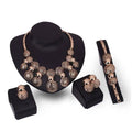 Rose gold korean bride jewelry set featuring intricate floral filigree spherical pendants with earrings bracelet and necklace