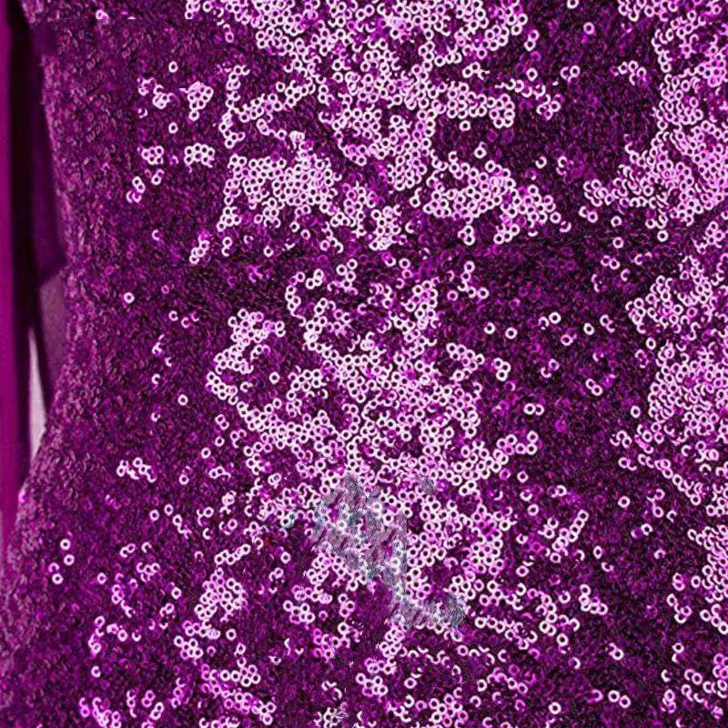 A shimmering purple sequined rose gold ombre shoulder fishtail sequin evening dress fabric with gradient highlights