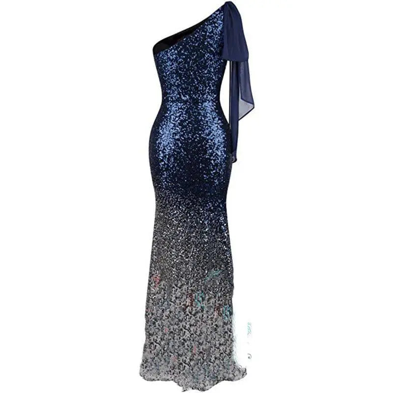 A fishtail sequin evening dress in rose gold ombre with one shoulder design and flowing satin sash