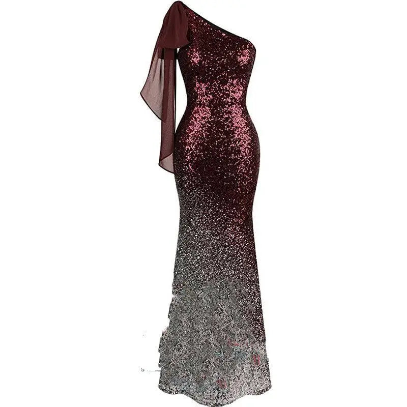 Rose gold ombre fishtail sequin evening dress featuring a shimmering burgundy-to-silver one shoulder design with sheer drape