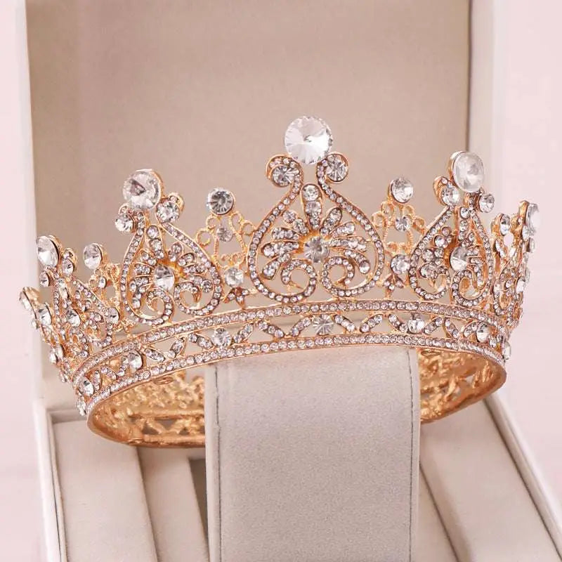 A sparkling rose gold rhinestone big European princess crown hair tiara with intricate filigree and clear crystals