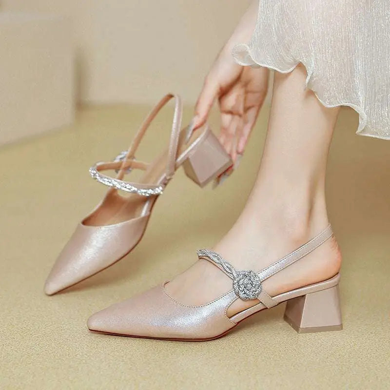 Shimmering rose gold satin pointed toe high heels with chunk chunky heel and sparkling crystal buckle mary jane style
