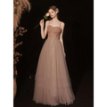 A champagne-colored golden suspender dress with rose gold sequin beaded bodice and layered tulle skirt for dress female dinner