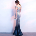 Rose gold sequined long slim fashion host gown with off-the-shoulder back and fitted mermaid silhouette in silver-blue