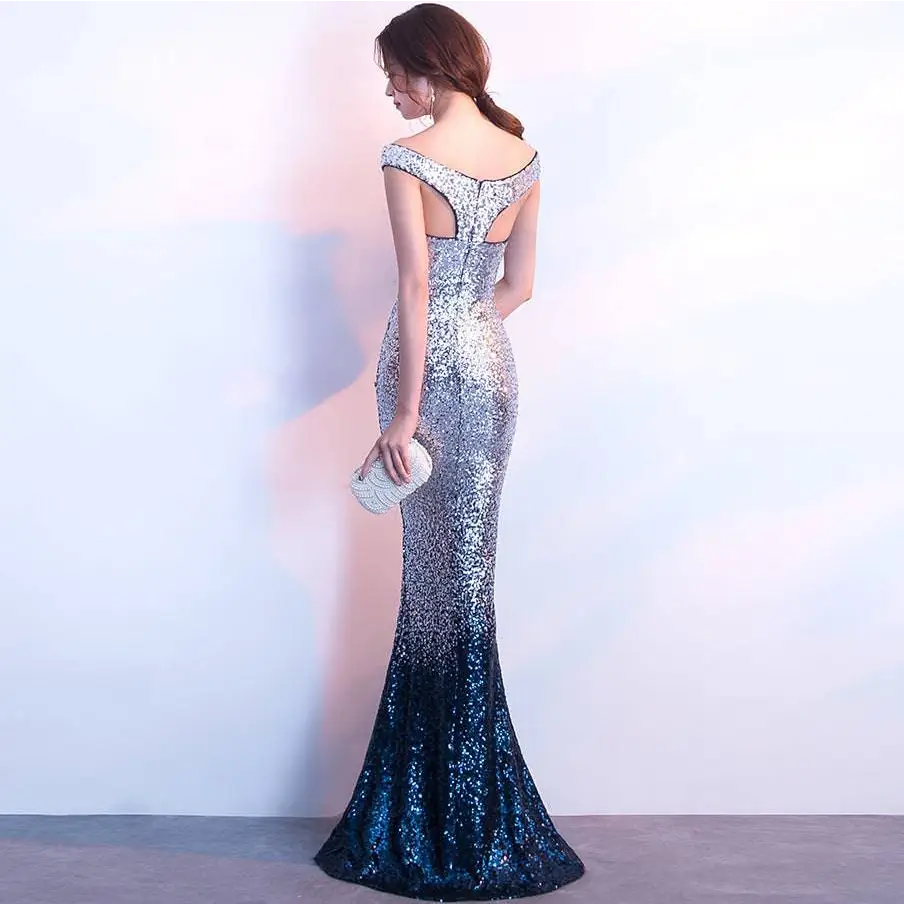 Rose gold sequined long slim fashion host gown with off-the-shoulder back and fitted mermaid silhouette in silver-blue