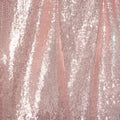 Rose gold sequined fabric with a textured reflective surface for large bridesmaid dress banquet wear