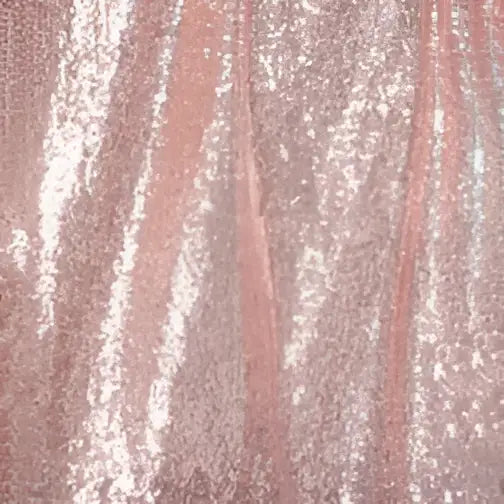 Rose gold sequined fabric with a textured reflective surface for large bridesmaid dress banquet wear