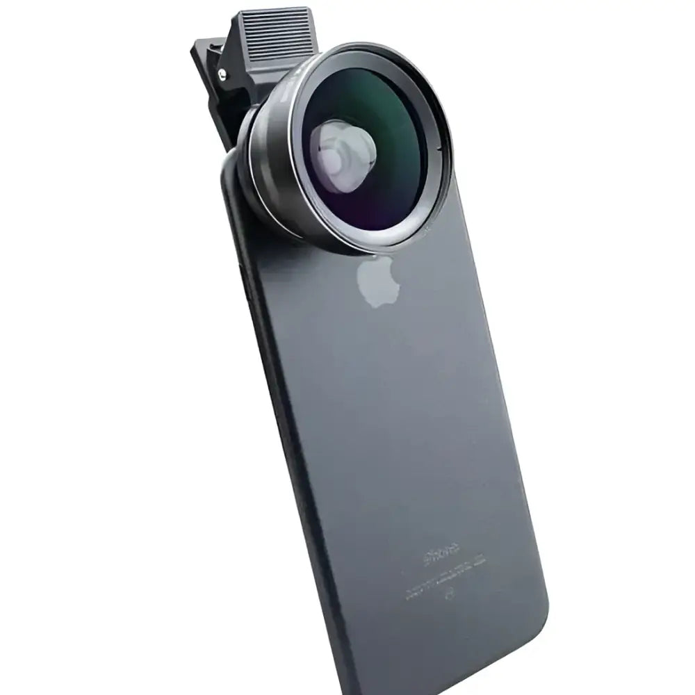 Black smartphone showing the back with a rose gold ultra wide angle clip-on camera lens attached for enhanced photography