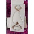 Rose quartz facial roller and gua sha wrinkle remover set with white jade stones and rose gold metal handles in white packaging