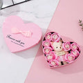 Rose red heart gift box with pink soap roses and teddy bear holding i love you sign for mother’s day gift