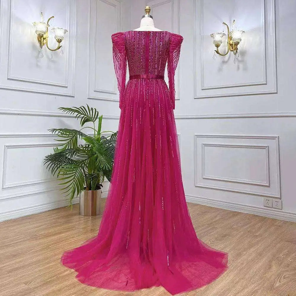 A rose red host performance sequin evening gown in vibrant fuchsia with long sleeves and a beaded bodice on a mannequin