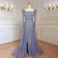 A shimmering light blue host performance sequin evening gown with long sleeves square neckline and matching belt