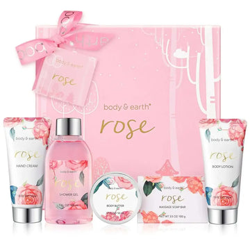 Rose spa gift set with pink rose-themed body lotion and essential oils in floral packaging with silver accents bath gift