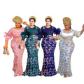 Four women in floral embroidery round neck slim fit half sleeve evening dresses with matching headwraps