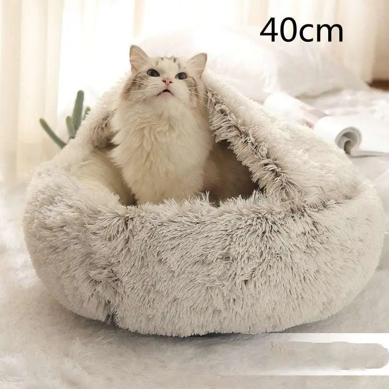 Soft fluffy gray cat bed pet with cozy plush texture and rounded shape in pink round plush faux fur design