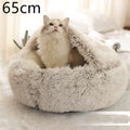 Soft fluffy beige cat bed pet with cozy faux fur texture and rounded shape in pink round plush design