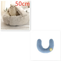 Pink round plush cat bed pet made of soft gray faux fur with a small embroidered smiley face on the side