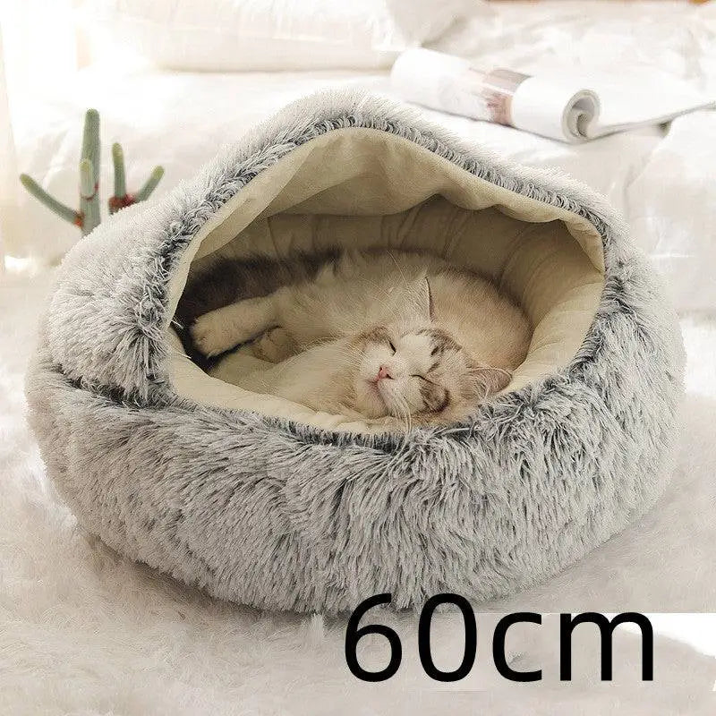 Gray plush cat bed pet with soft faux fur exterior and cozy beige interior lining for warm pink round plush comfort