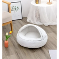 White plush cat bed pet with cozy rounded design and soft faux fur pink round plush fabric for warmth
