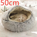 A cozy plush gray cat bed pet with soft faux fur inner lining in a pink round plush warm cat bed pet design