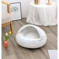 White plush cat bed pet with cozy rounded design and soft faux fur interior for warmth and comfort