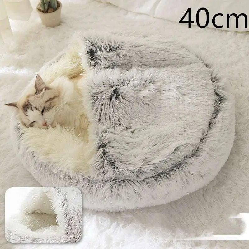 Pink round plush cat bed pet featuring fluffy gray and white faux fur with a cozy round design for warmth