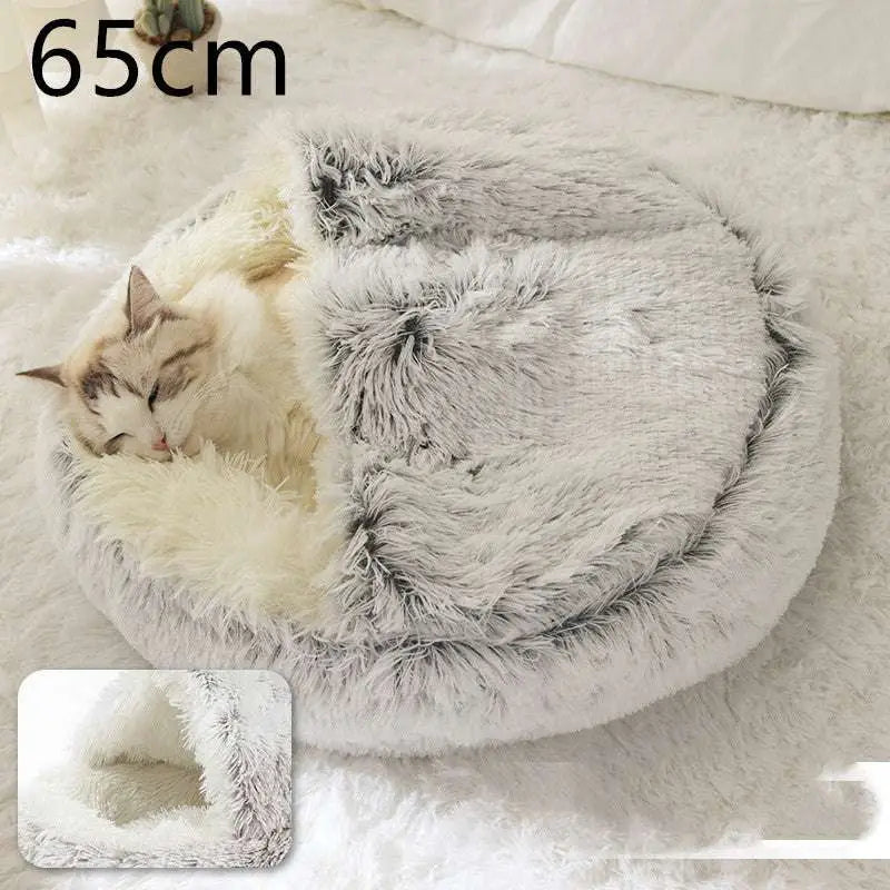 Pink round plush cat bed pet with cozy round shape and soft gray and white faux fur lining for warmth and comfort