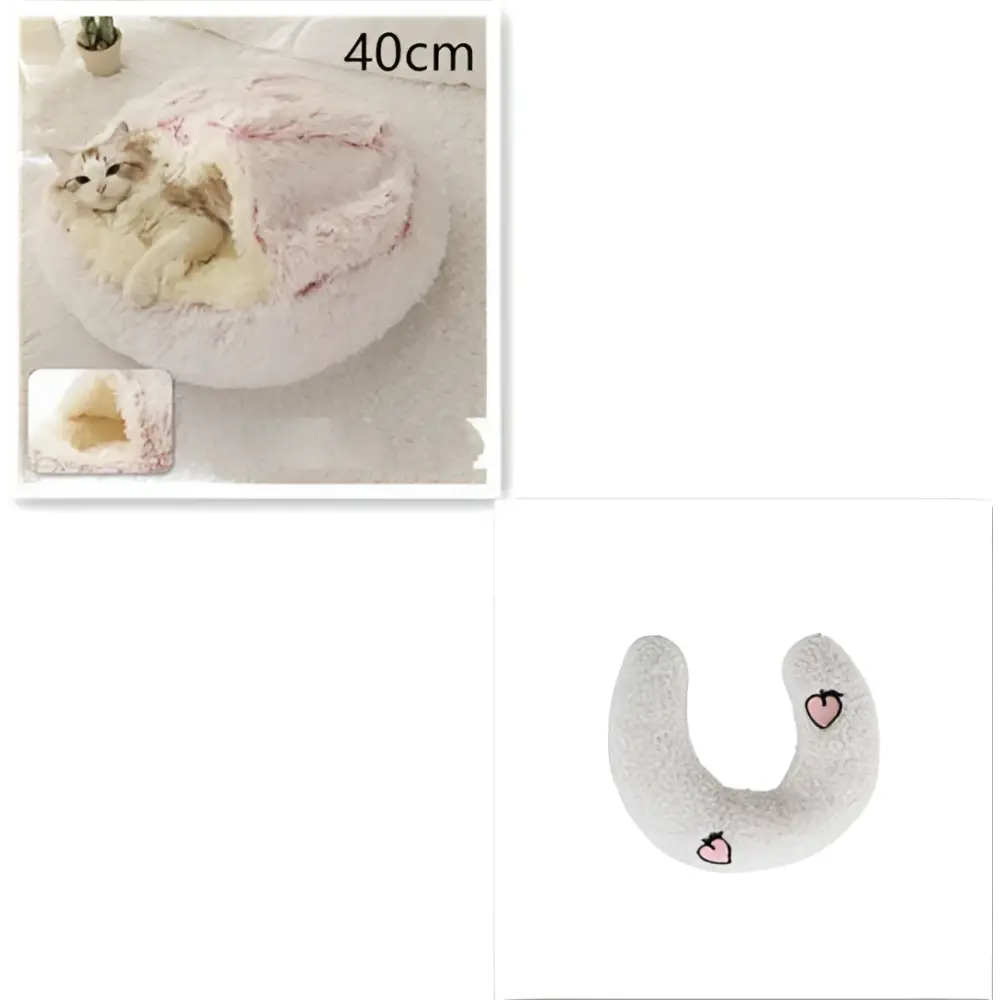 A pink round plush cat bed pet with soft pink heart accents and a warm faux fur fluffy interior for comfort
