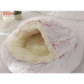 Pink round plush cat bed pet with fluffy white and cream faux fur and soft fuzzy texture for warmth and comfort