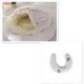 Pink round plush cat bed pet in faux fur with cream interior and heart embroidery for warm comfort