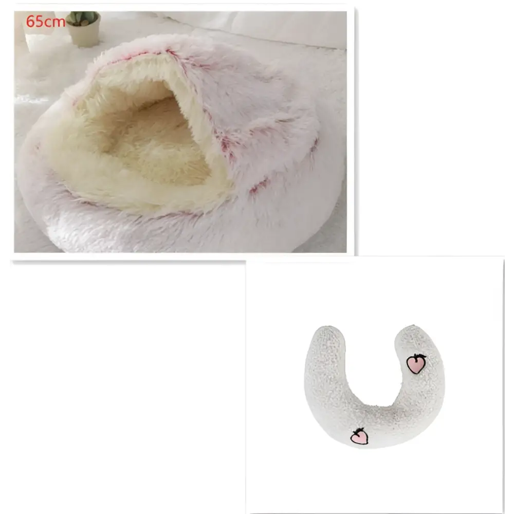 Pink round plush cat bed pet in faux fur with cream interior and heart embroidery for warm comfort