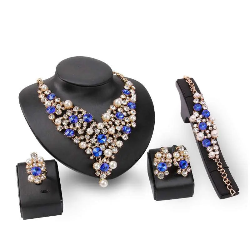 Elegant gold-toned royal blue bridal clothing accessories necklace earrings set with pearls crystals and rhinestones