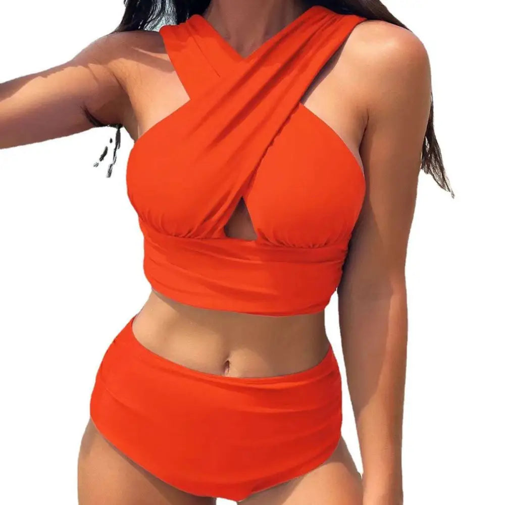 Vibrant orange two-piece swimsuit with a cross halterneck pleated top and high-waisted bottoms for stylish swimwear