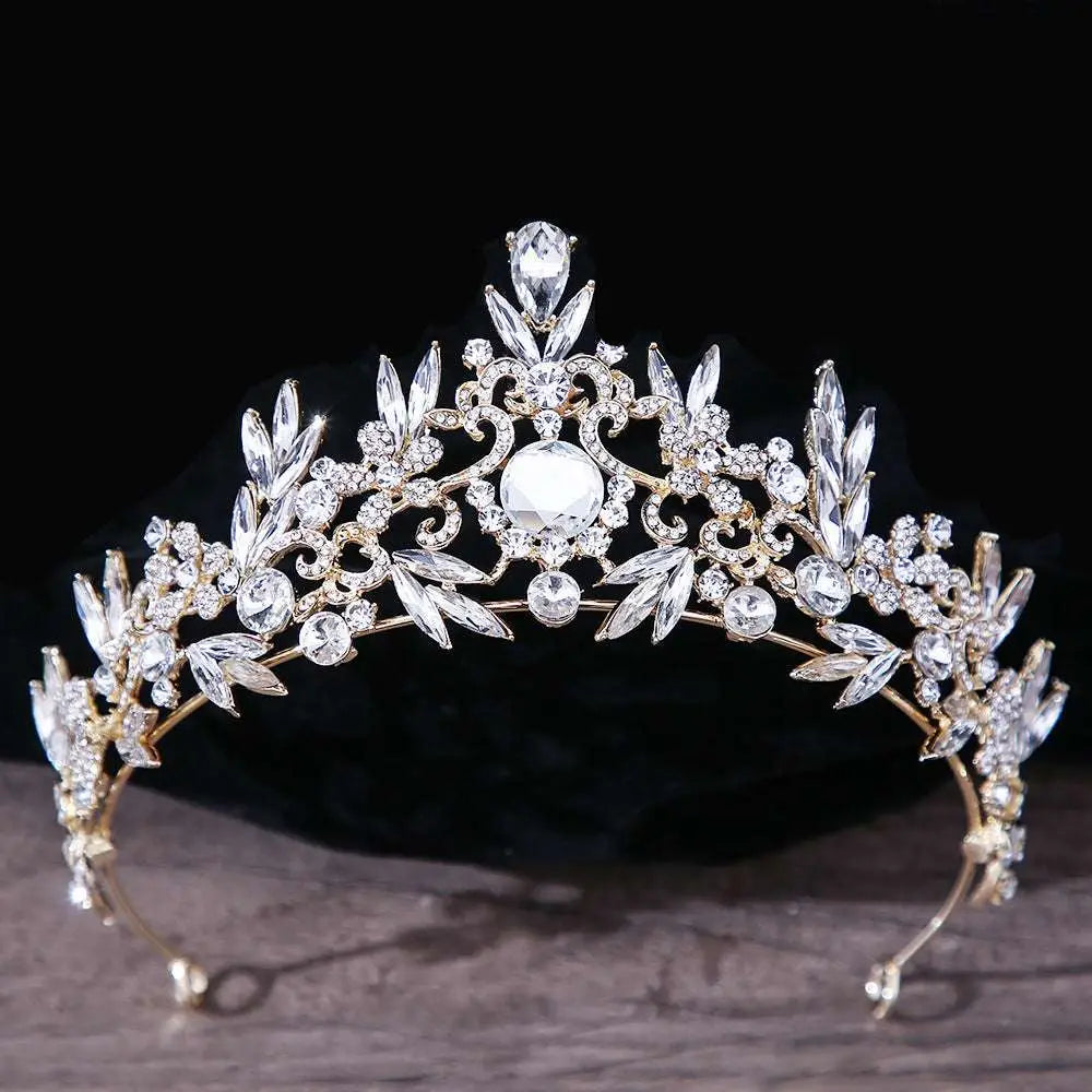 Royal blue gold rhinestone mitzvah crown with sparkling gold tiara, clear crystals, leaf embellishments, and central gemstone