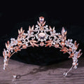 Royal blue gold rhinestone mitzvah crown featuring a rose gold tiara with peach and clear crystal floral design