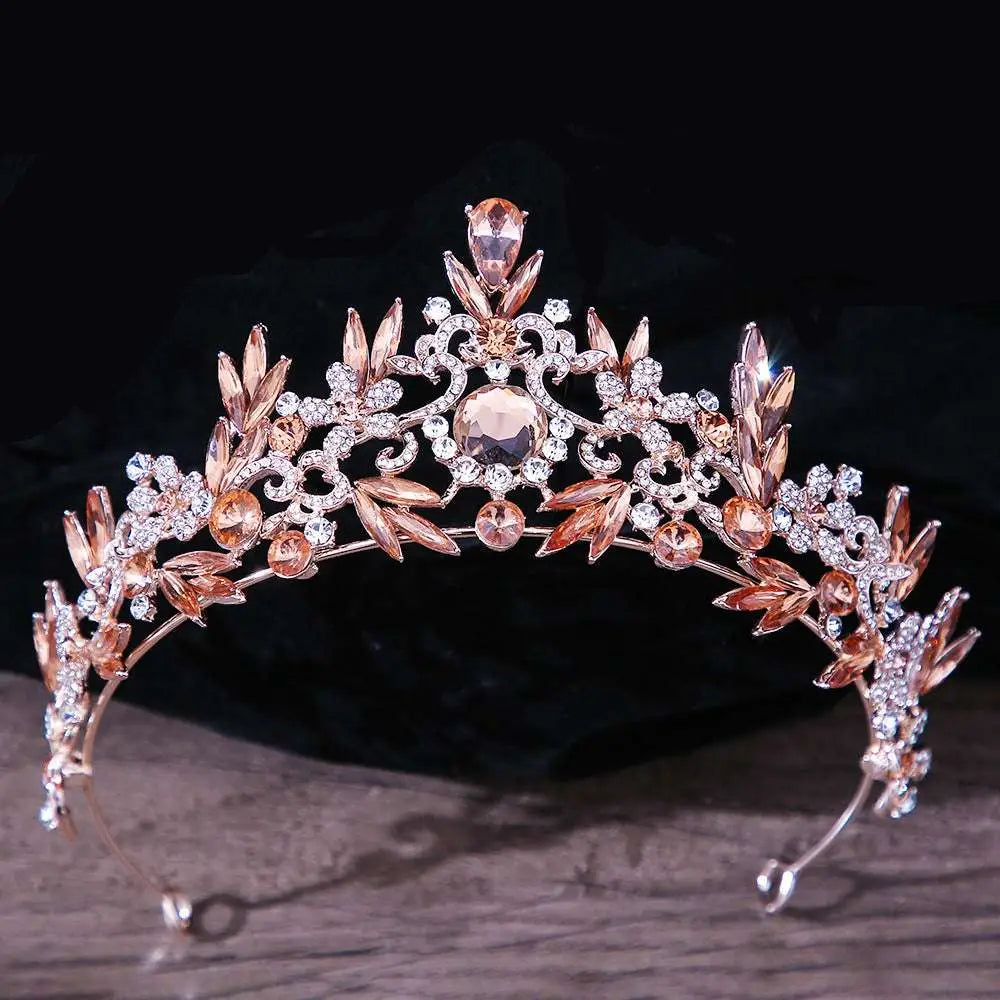 Royal blue gold rhinestone mitzvah crown featuring a rose gold tiara with peach and clear crystal floral design