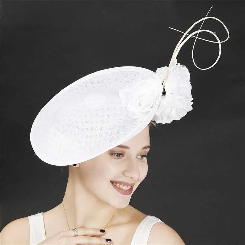Royal blue headdress bride beige hat in imitation linen featuring a white woven fascinator with floral and wire accents