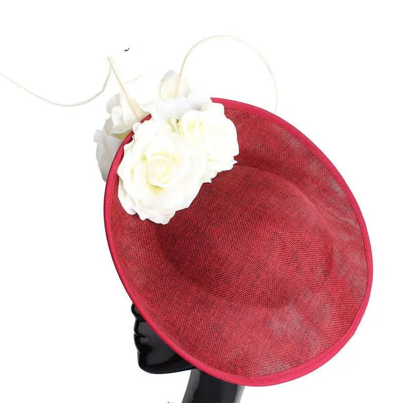 A vibrant red fascinator hat with white roses and wire antennae for royal blue headdress bride beige imitation linen