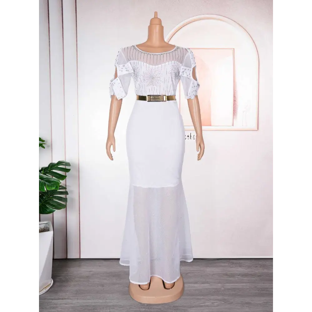 Royal blue heavy embroidered hot diamond beads gown with white lace mesh, flutter sleeves, fitted bodice, and gold belt