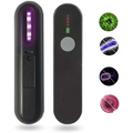 Black handheld uv disinfection device with purple led lights and power button royale essence lux lux uv sanitizer