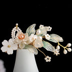 Green and white flower pair