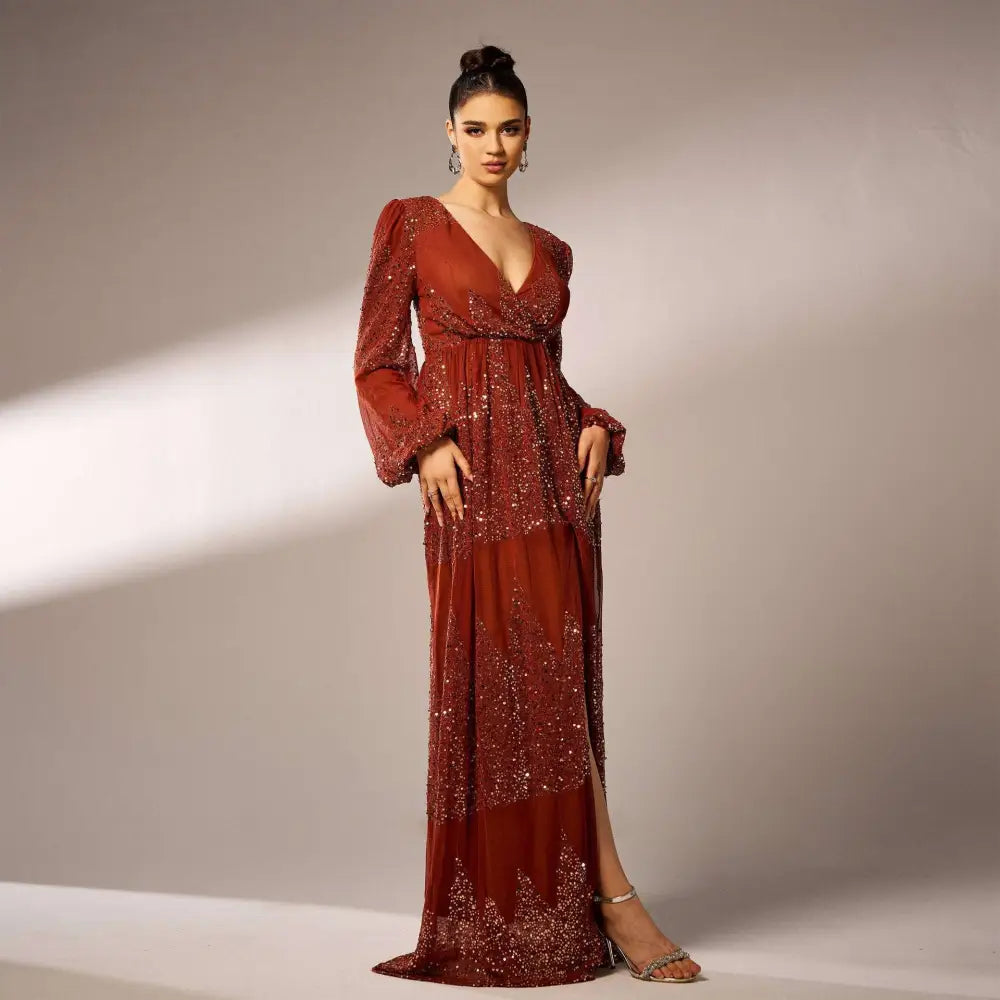 A rust bell sleeve sexy long sequined evening dress with shimmering fabric and sheer long sleeves