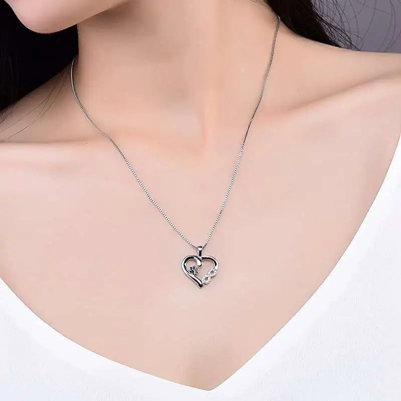 Silver heart necklace s925 fashionable pet dog paw design with delicate chain and small embedded stones in silver color