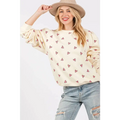 Cream-colored sage fig long sleeve sweatshirt featuring a playful fig heart printed pattern with small pink hearts