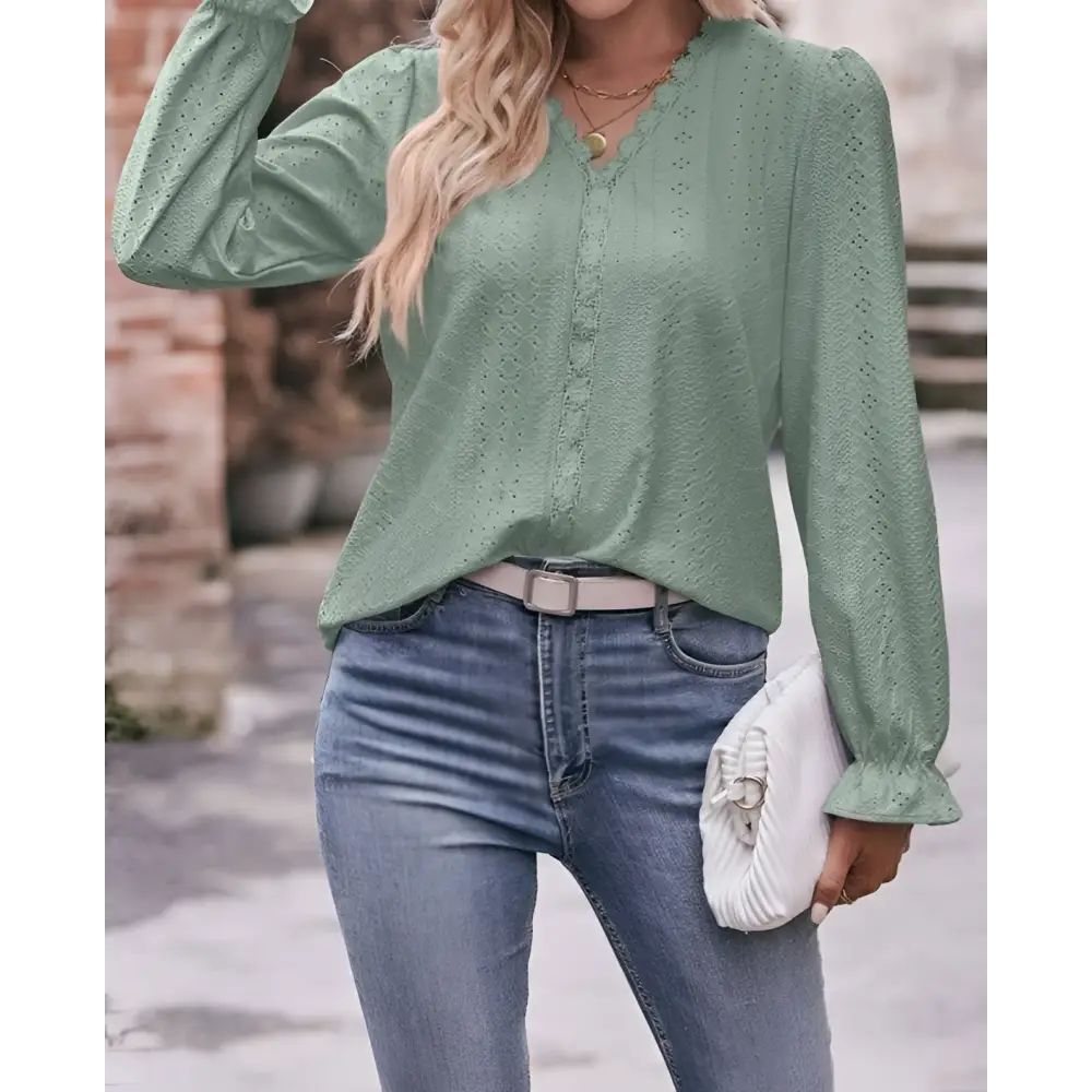 A soft sage green lace sleeves fashionable blouse with long sleeves and a flattering v-neckline